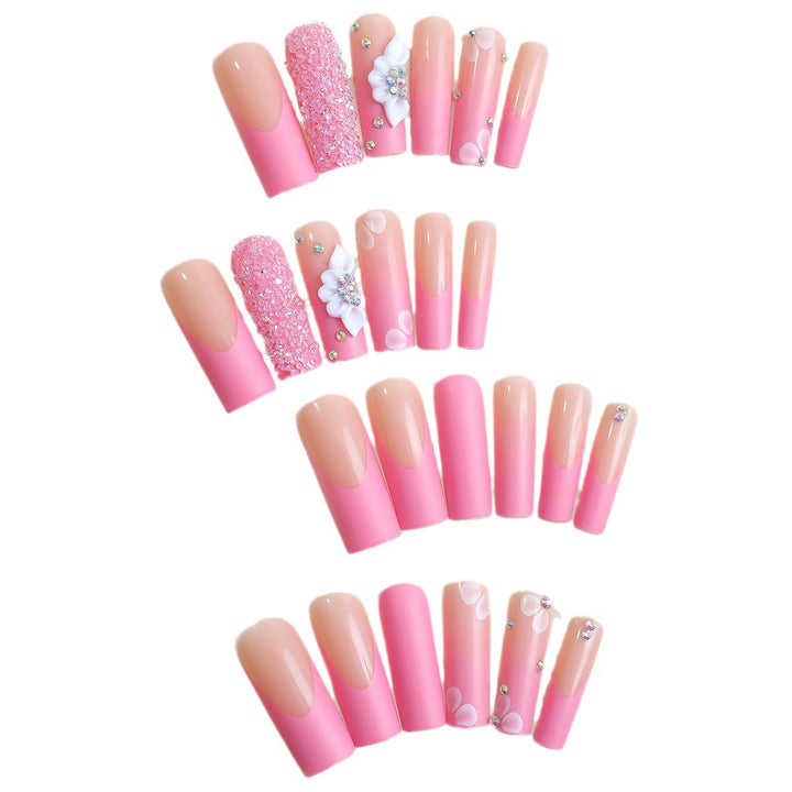 Acrylic nail set with sparkling glitter and delicate flower decorations Kalsten