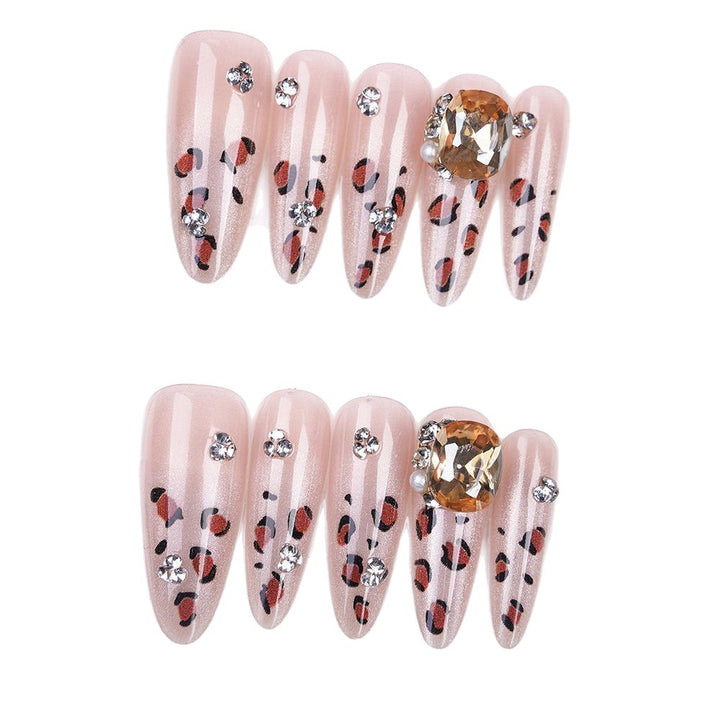 Artificial nails with elegant leopard motif and glitter details Kalsten
