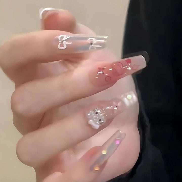 Artistic Press-On Nail Extensions with Floral Embellishments Kalsten