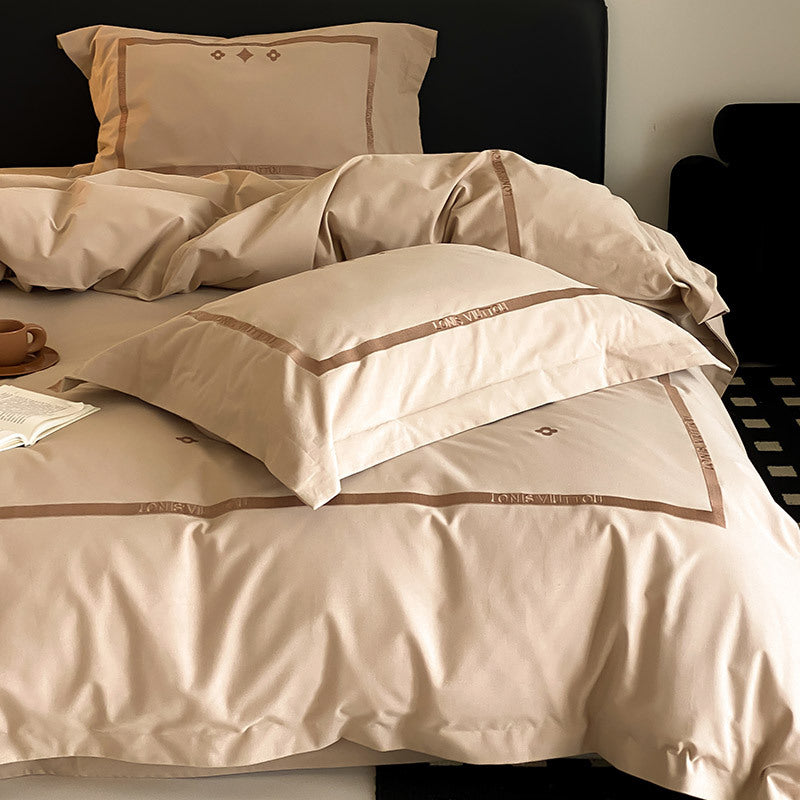 Luxurious cotton satin bedding set with embroidered border edge