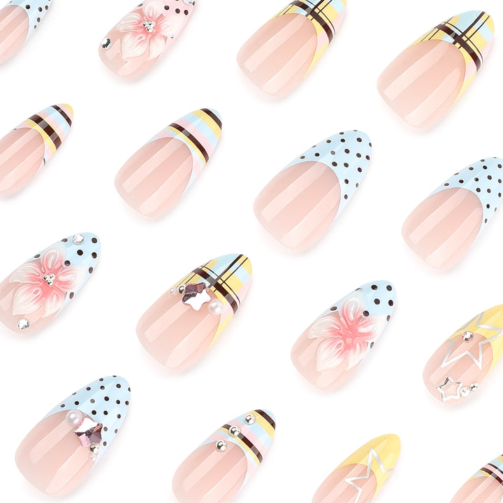 Creative nail designs with floral accents and glitter Kalsten