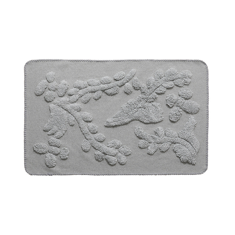 Luxurious organic cotton bath mat with relief pile structure Kalsten