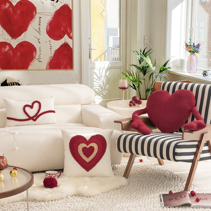Heart-shaped cuddle cushion with extended arm applications Kalsten