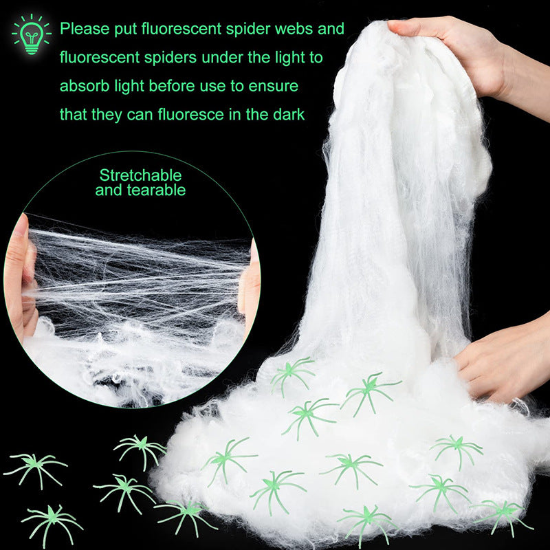 Decorative Halloween spider web with artificial spiders