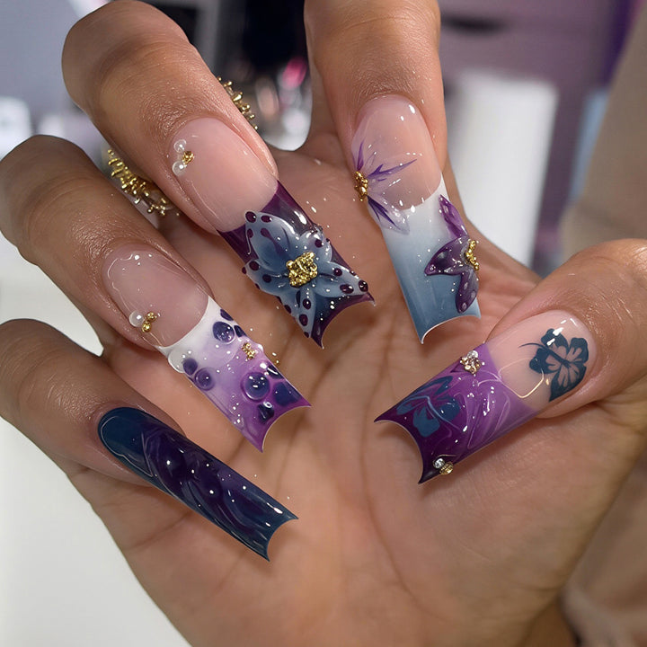 Artistic Long Nail Design with Floral Accents Kalsten