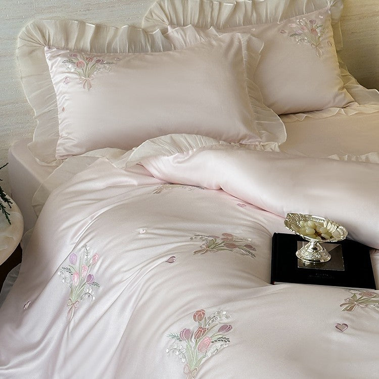 Satin bedding set with pleated frill and delicate embroidery