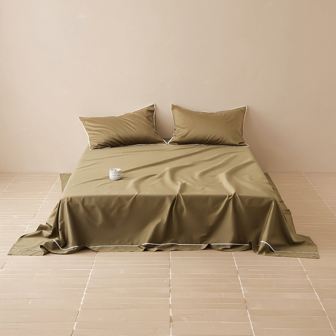 Noble cotton satin bed sheet and pillowcase set with fine piping