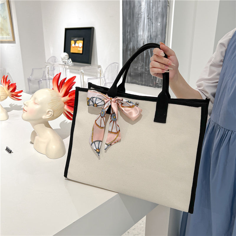 Spacious Canvas Tote Bag with Decorative Ribbon