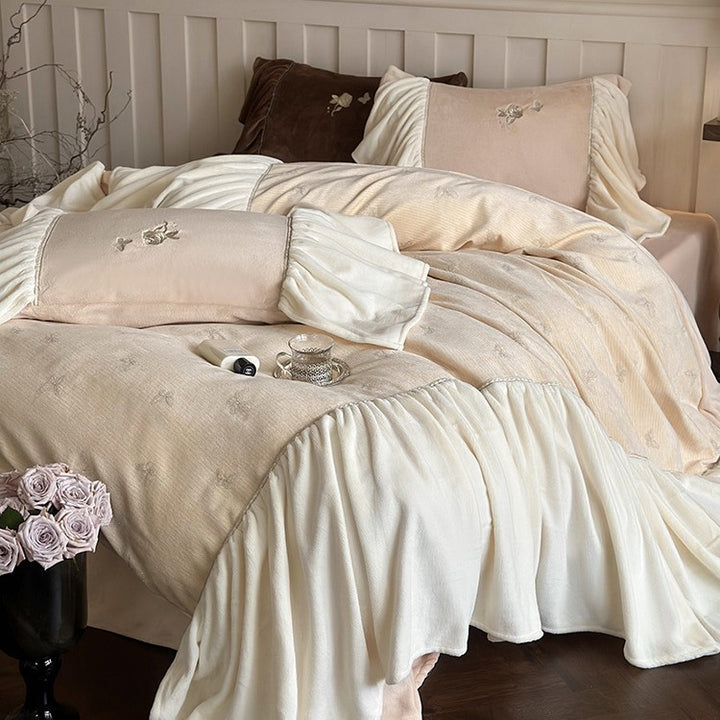 Satin bedding set with gathered ruffles and delicate butterfly embroidery