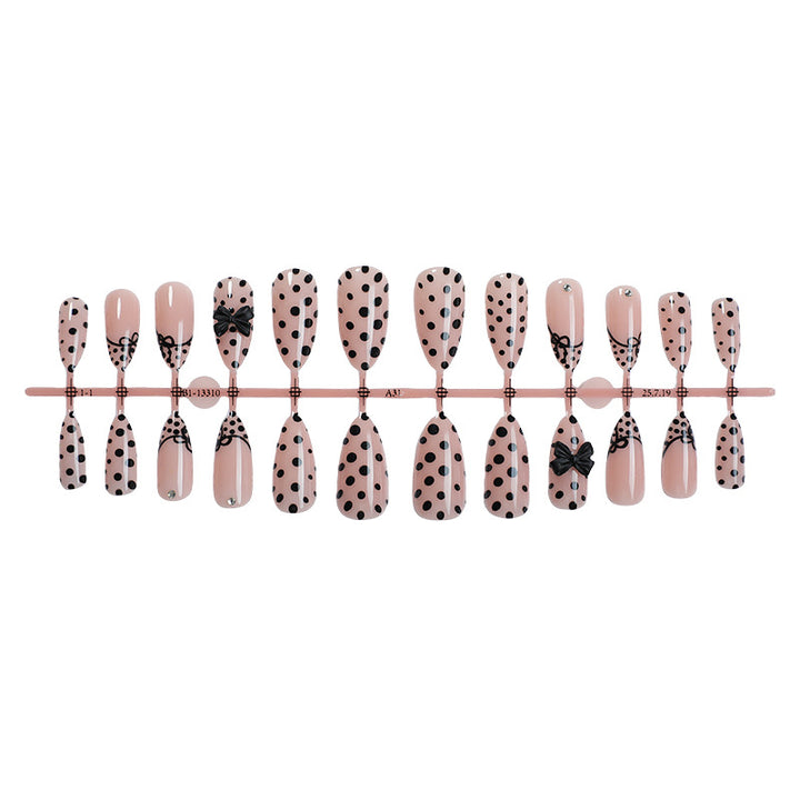 Creative nail art set with elegant dots and bow decorations Kalsten