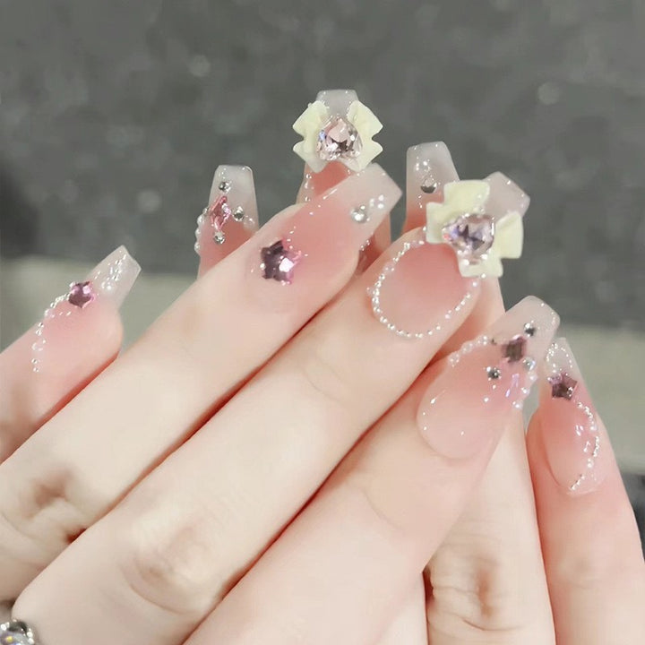 Glamorous artificial fingernails with glitter and moon designs Kalsten