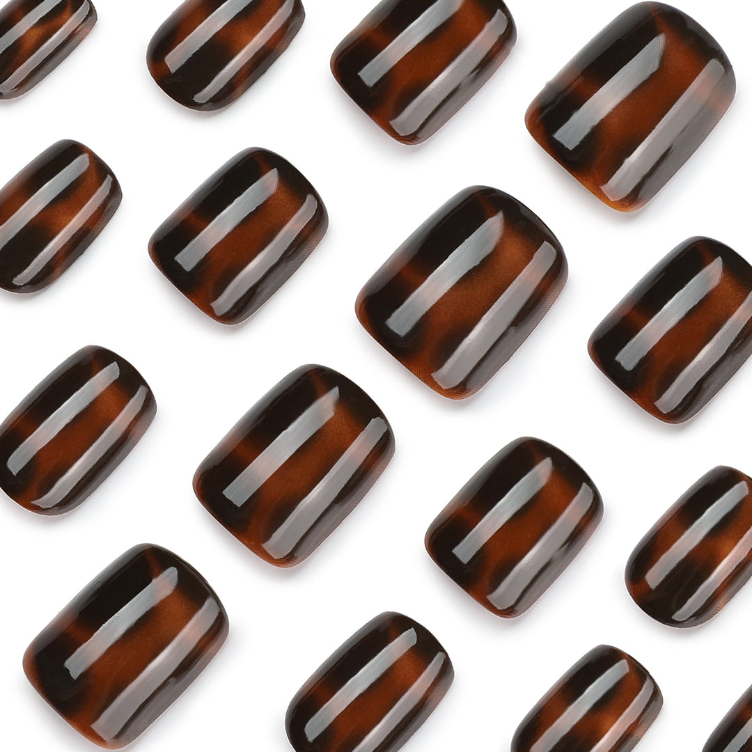 Artificial nail extensions with elegant tortoiseshell decor Kalsten