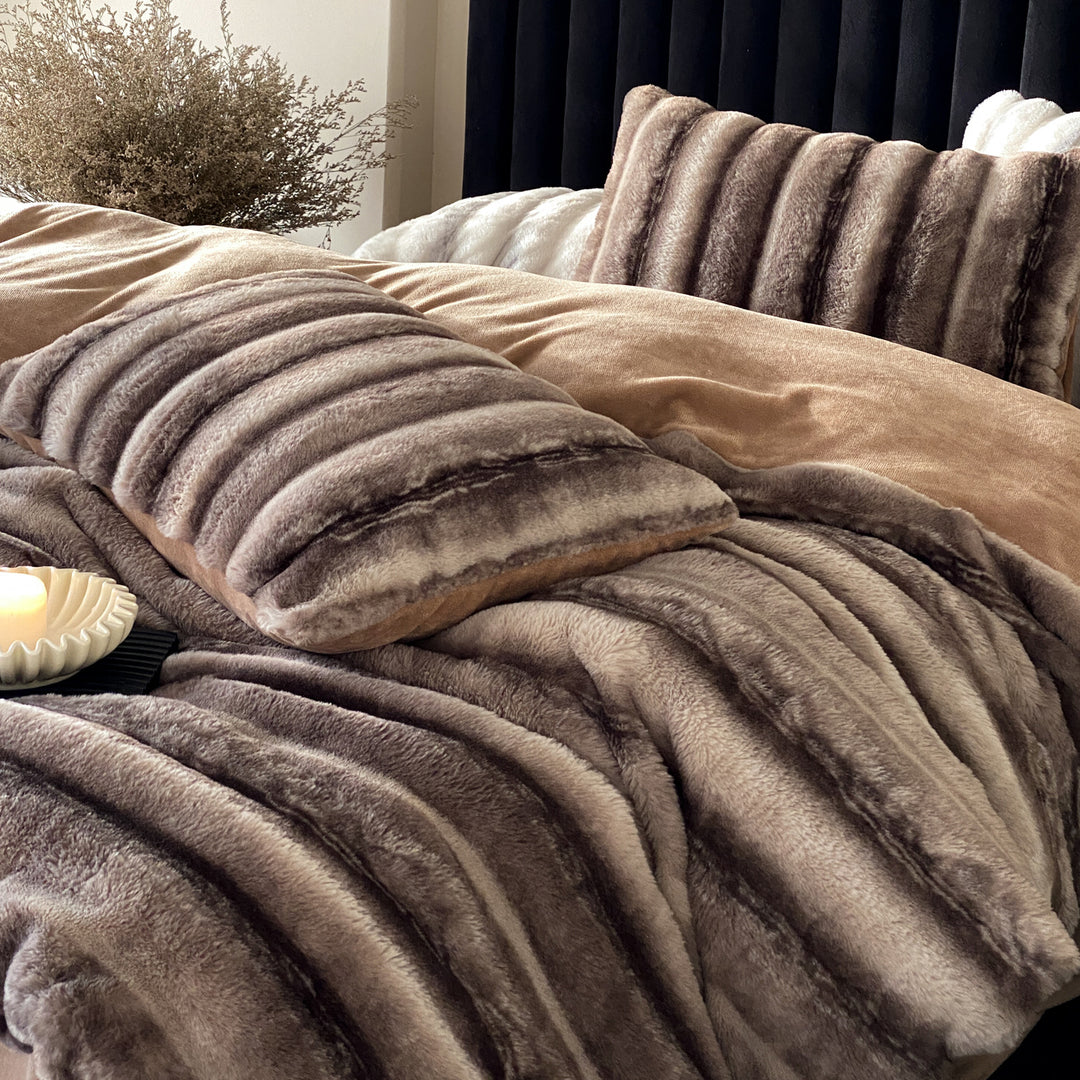 Luxury faux fur throw and cushion set with striped texture