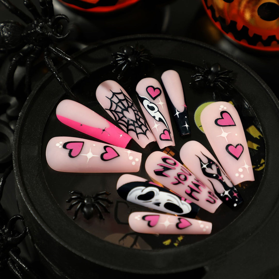 Artificial nail art with Halloween motif and unique embellishments Kalsten