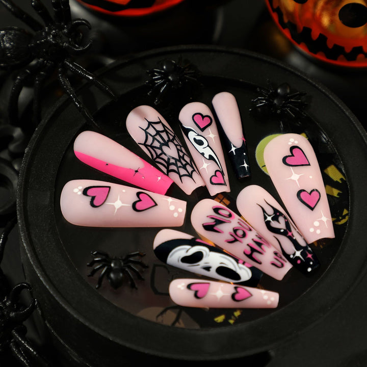 Artificial nail art with Halloween motif and unique embellishments Kalsten