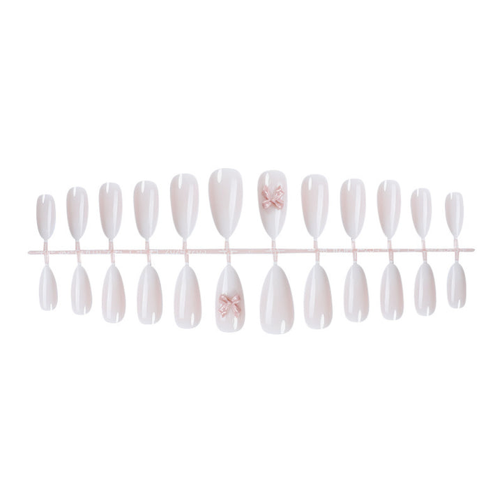 Elegant Press-On Nail Art Set with Glossy Finish and Cute Bow Details Kalsten