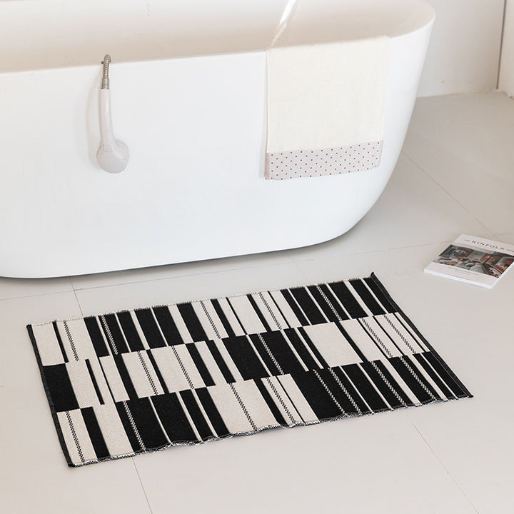 Flat-woven bath mat with abstract geometric pattern Kalsten