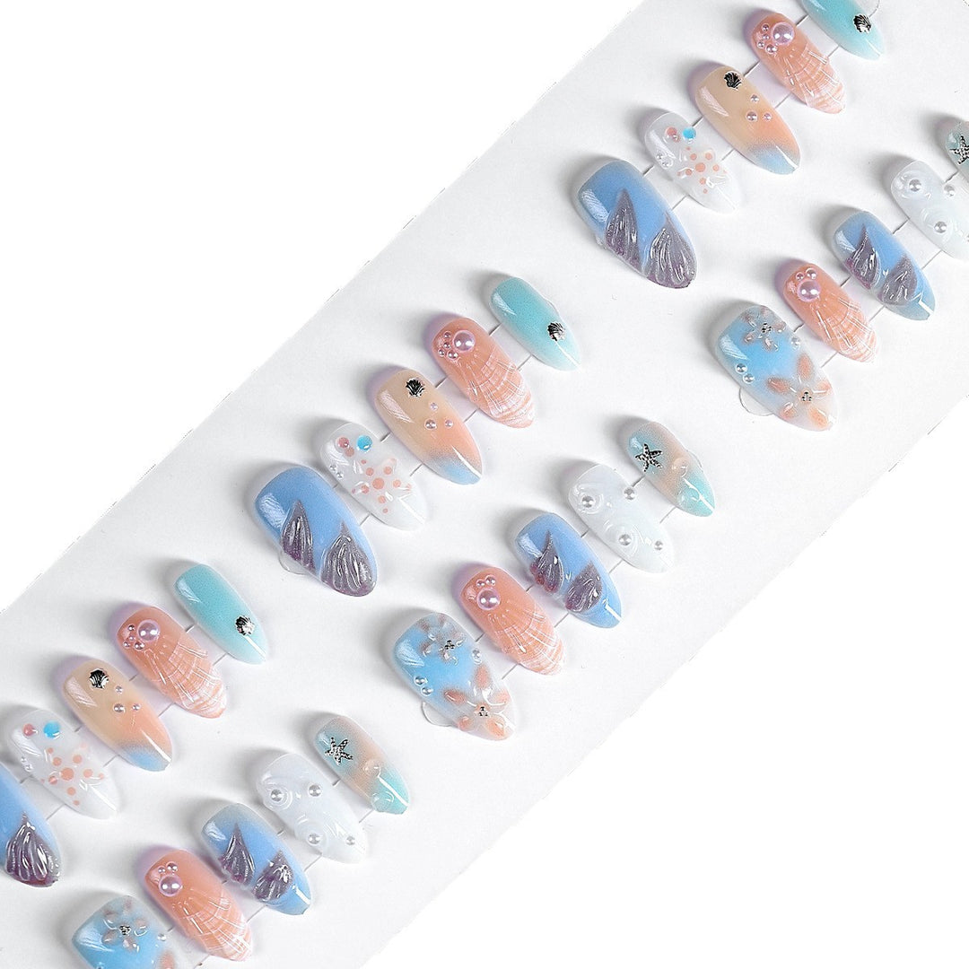 Creative nail art set with delicate floral and maritime designs Kalsten