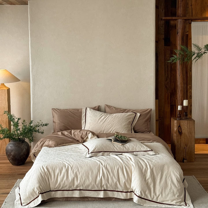 Premium bedding set made of breathable cotton blend with contrasting piping