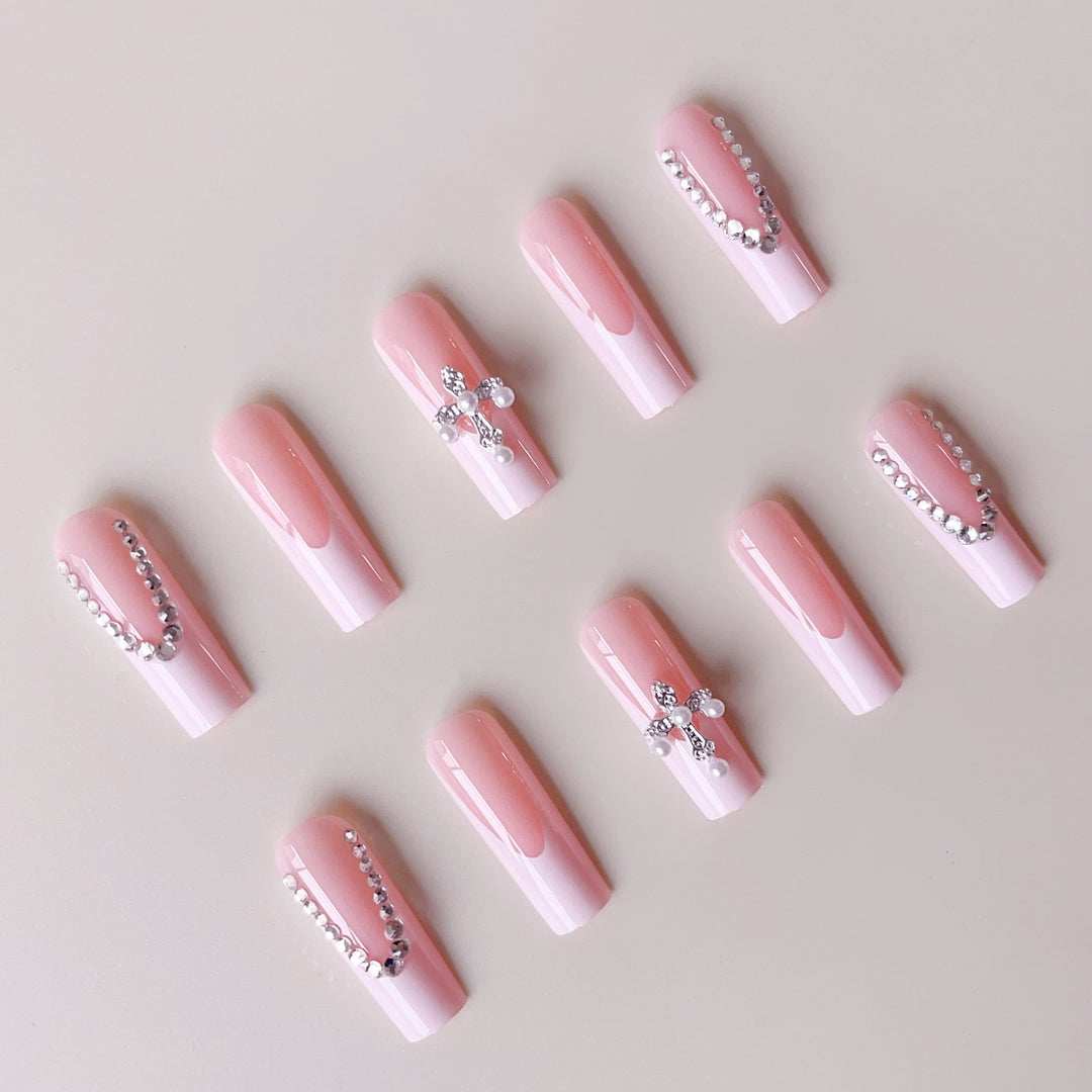 Acrylic nail set with glamorous rhinestone decorations and elegant French tips Kalsten