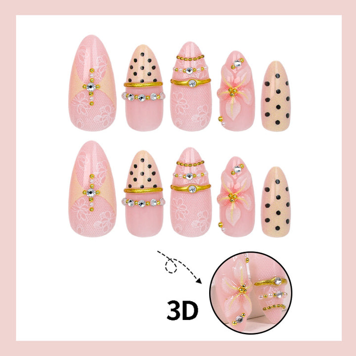 Artificial nail set with delicate floral patterns and elegant accents Kalsten