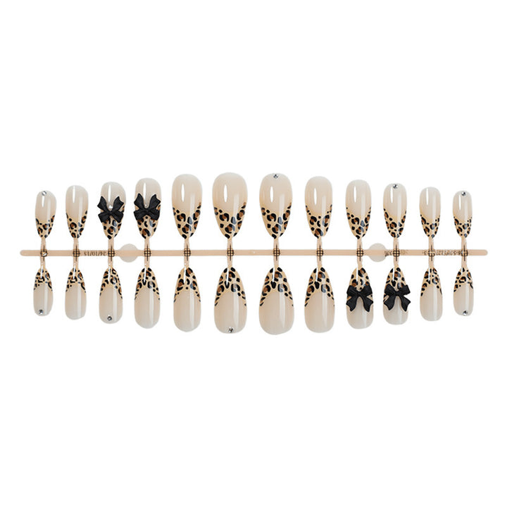 Nail art set with leopard pattern and glitter embellishments Kalsten