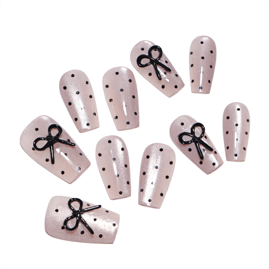 Artful Nail Extensions with Bow Pattern Kalsten