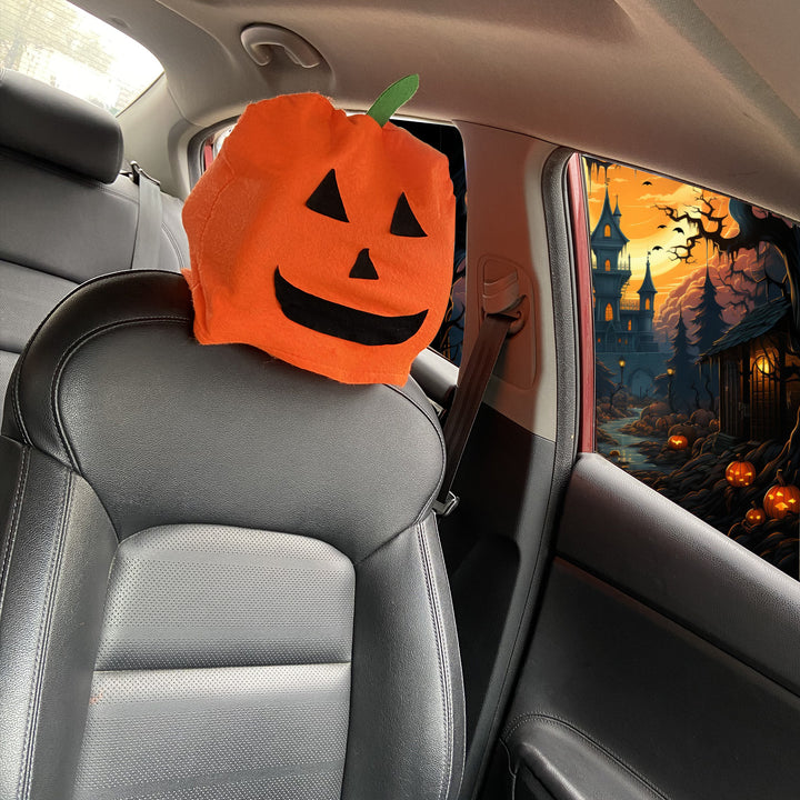 Plush decorative pillow with pumpkin face