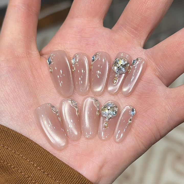 Glamorous artificial nails with rhinestone embellishments Kalsten