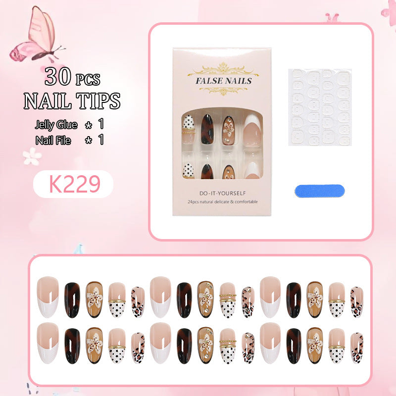 Exquisite nail art with elegant embellishments Kalsten