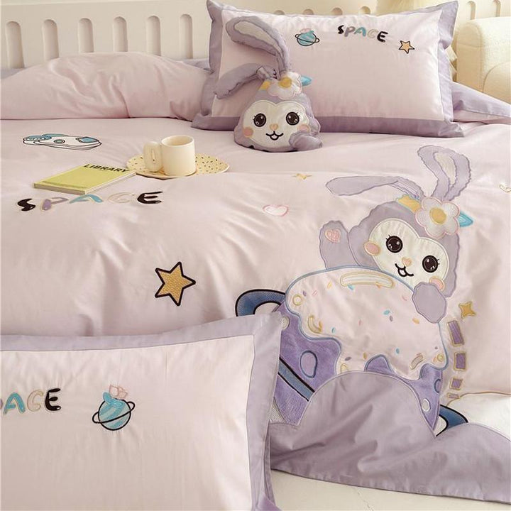 Children's bedding set with playful space bunny design