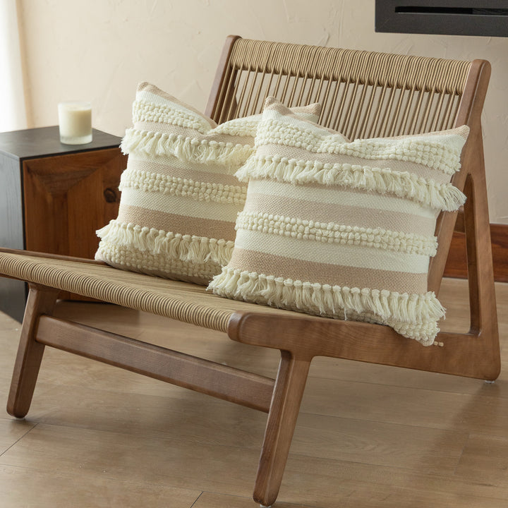 Handwoven Boho decorative pillow with tiered fringe stripes and boucle appliqués