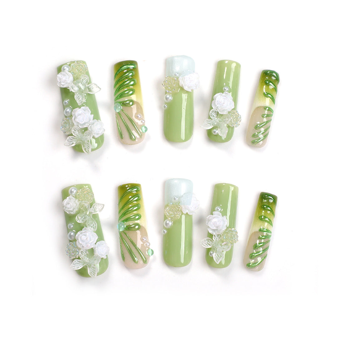 Creative nail set with floral design and delicate accents Kalsten
