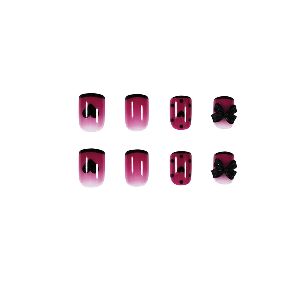 Artistic nail extensions with cute bow and heart designs Kalsten