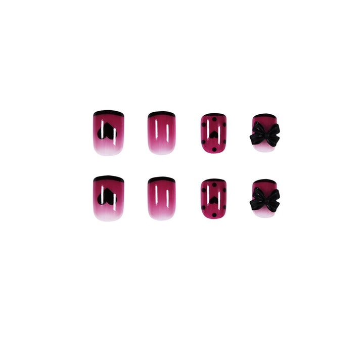 Artistic nail extensions with cute bow and heart designs Kalsten