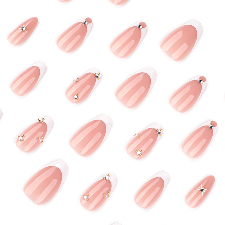 Glamorous nail art with rhinestones and gold accents Kalsten