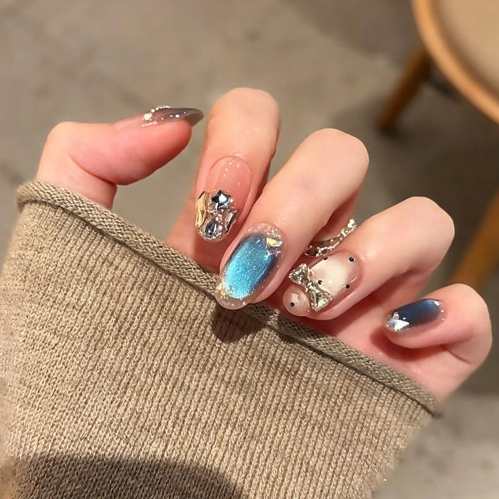 Art nails in elegant premium design with rhinestone and glitter elements Kalsten