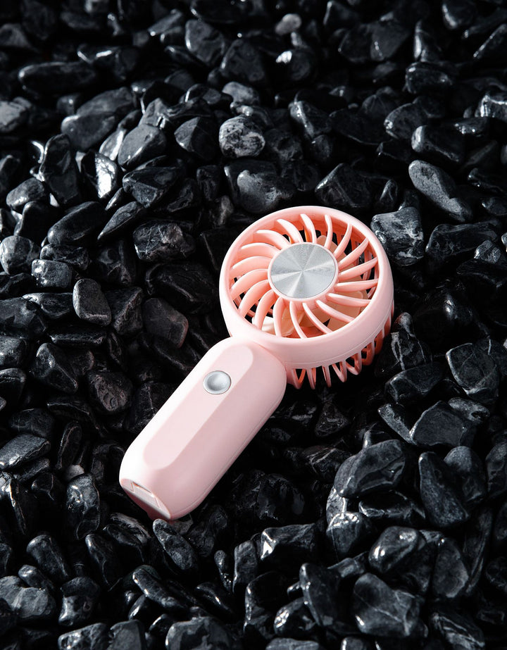 Women's portable mini fan with ergonomic grip technology Kalsten
