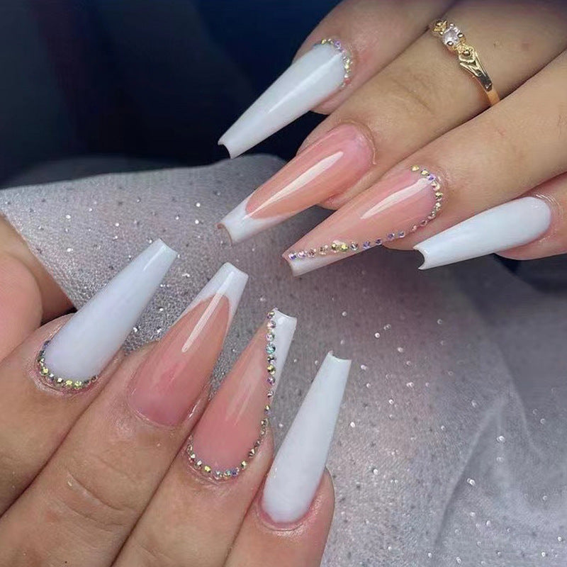 Artful nail extensions with rhinestone embellished accents Kalsten