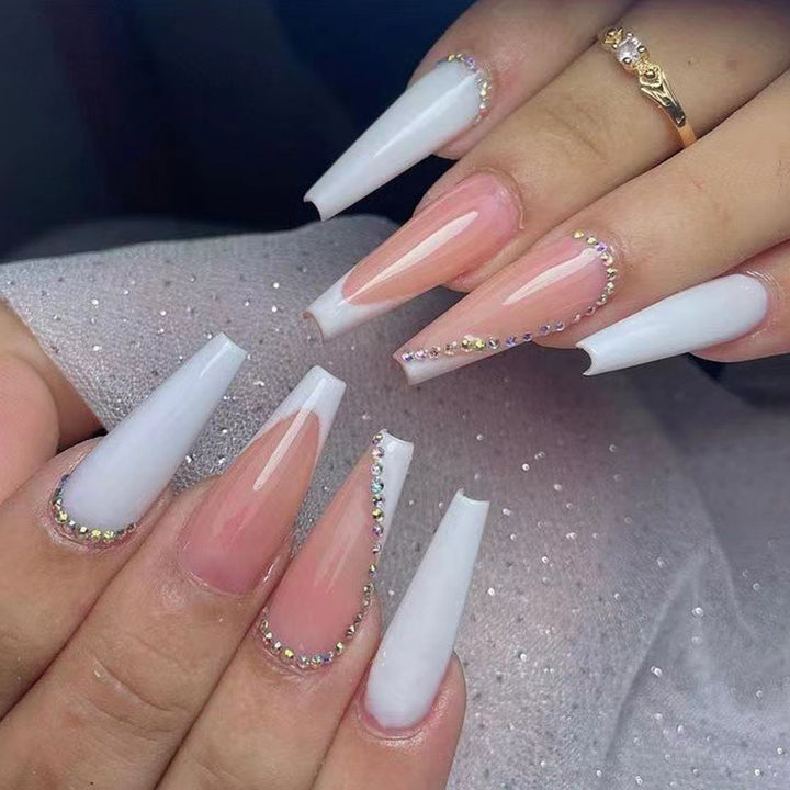 Artful nail extensions with rhinestone embellished accents Kalsten