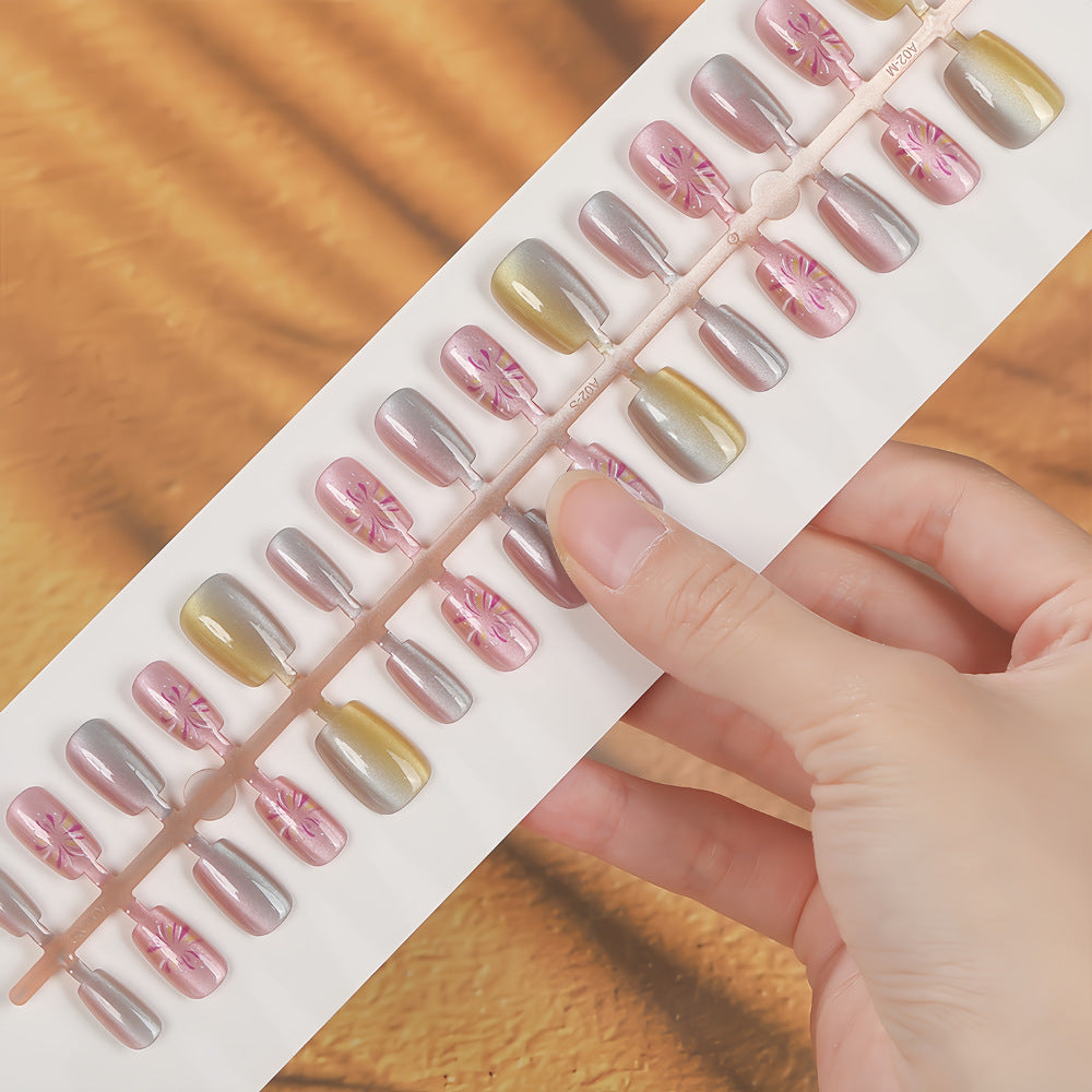 Artificial nails in modern ombre design with floral accents Kalsten
