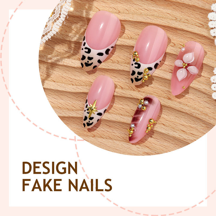 Acrylic nail set with glamorous accents and floral decorations Kalsten