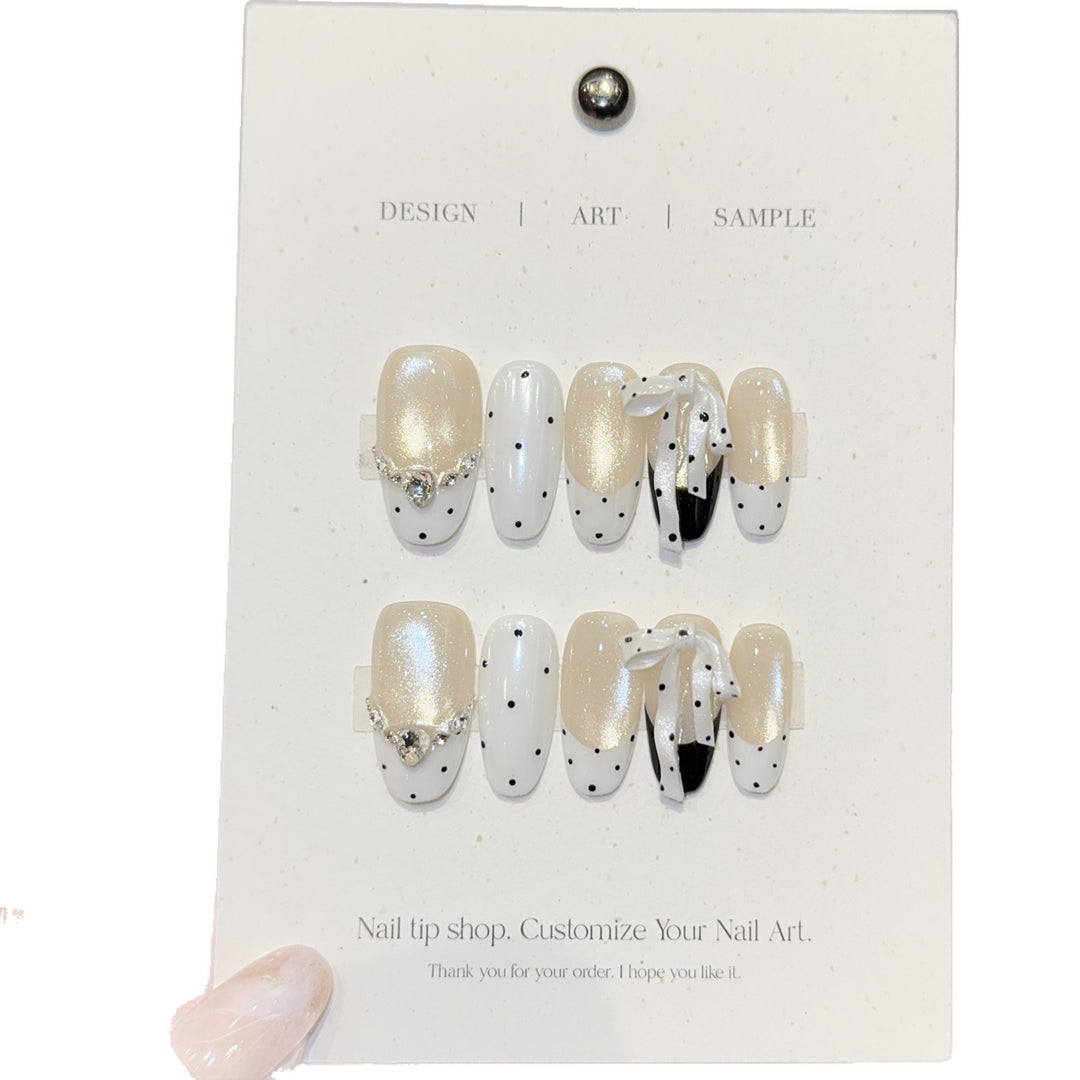 Artificial nails with glitter and bows Kalsten