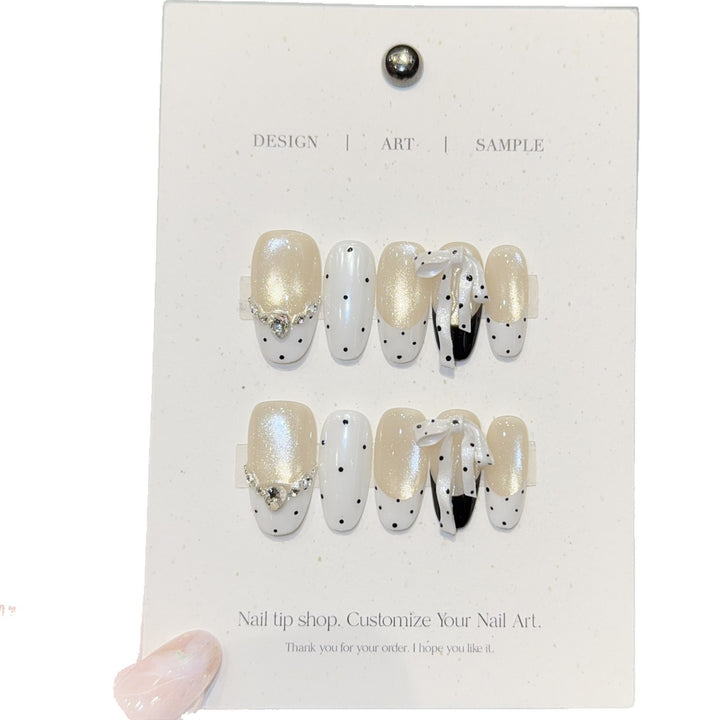 Artificial nails with glitter and bows Kalsten