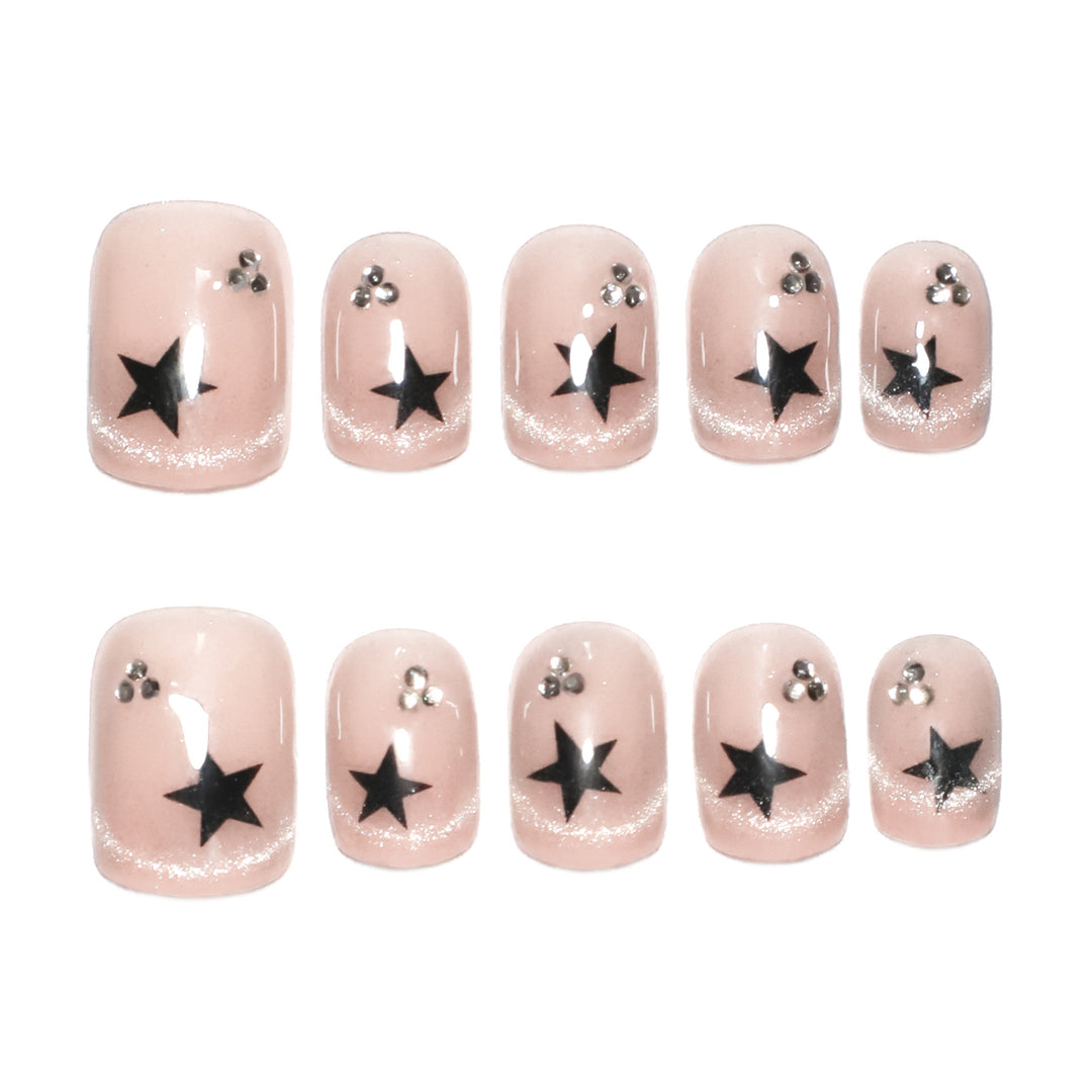 Artistic acrylic nails with glamorous star motifs Kalsten