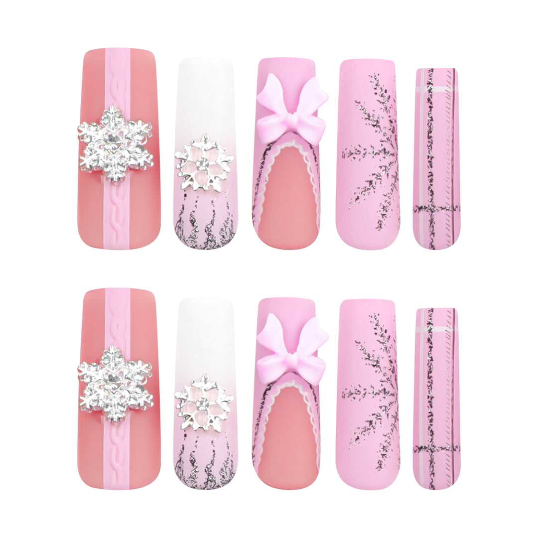 Artful nail extensions with festive decorations Kalsten