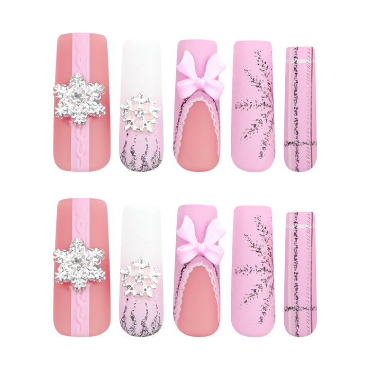 Artful nail extensions with festive decorations Kalsten