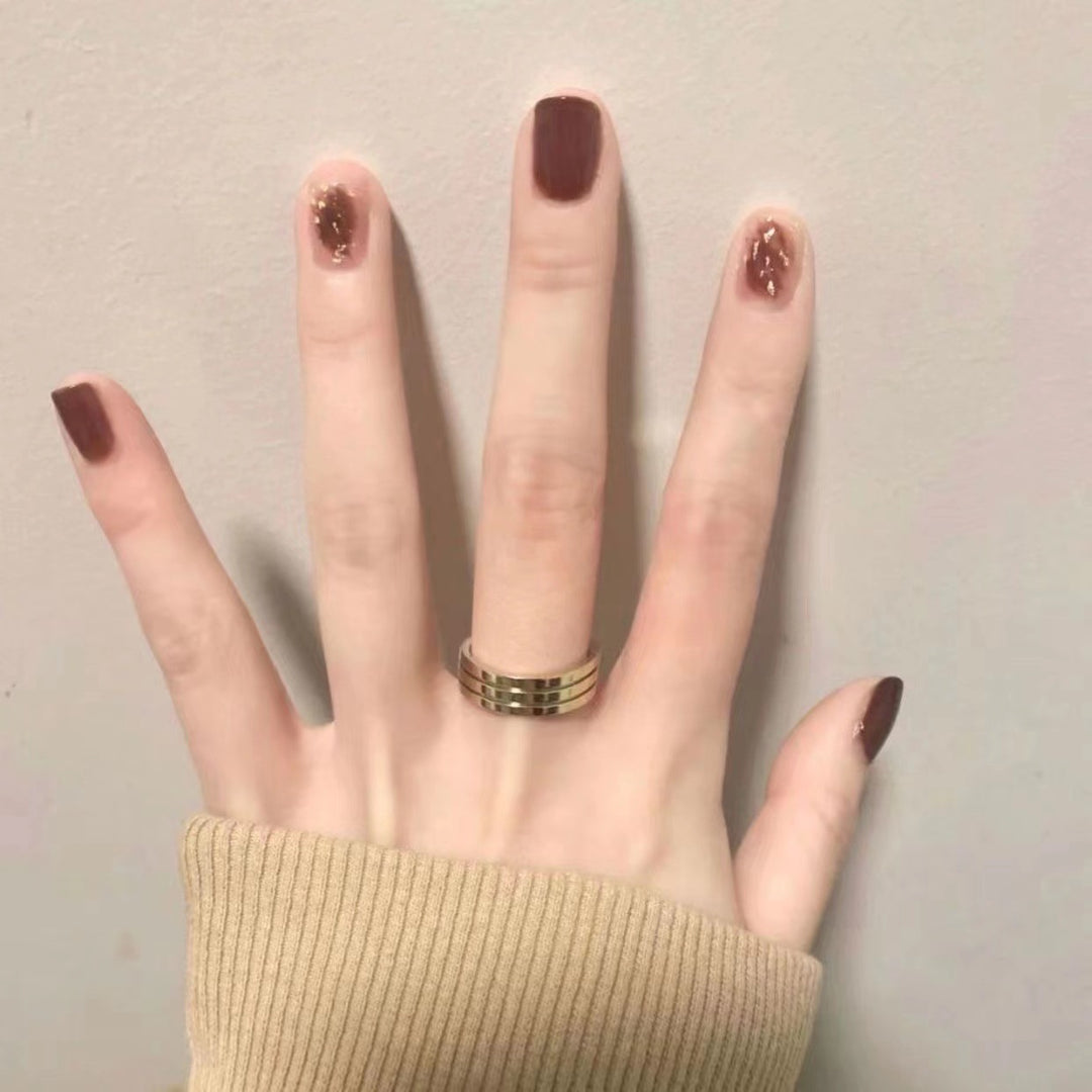 Artistic Press-On Nail Set with Gold Accents