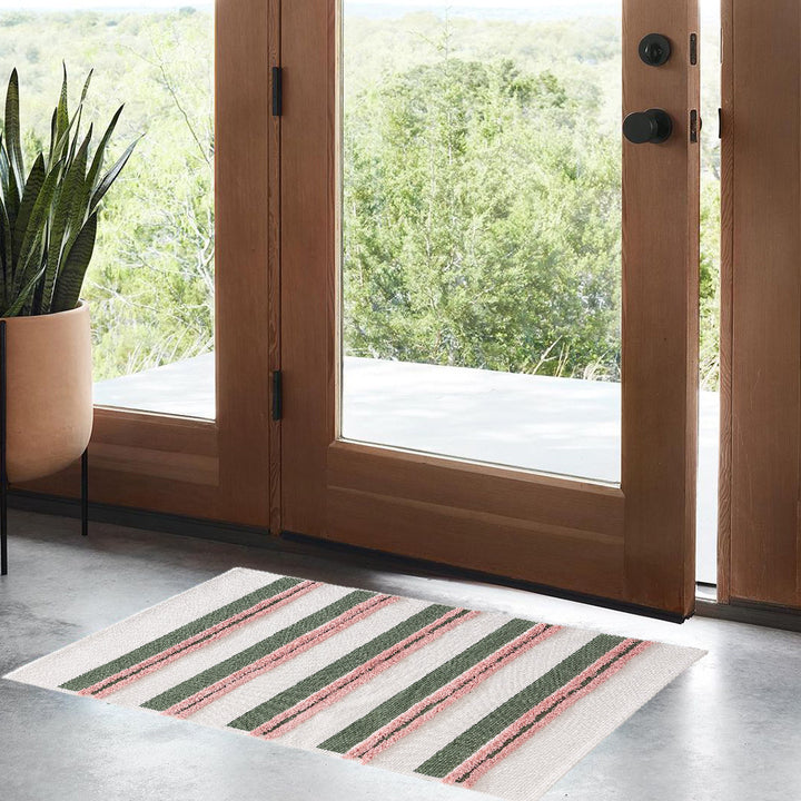 Cotton bath mat with textured stripes and fringes Kalsten