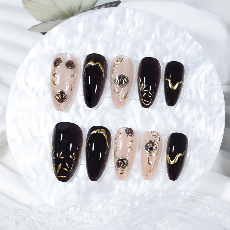Nail set with elegant gold embellishments and original patterns Kalsten